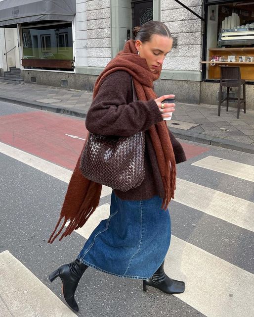 Brown Sweater, denim skirt, brown scarf and black leather boots fall outfit