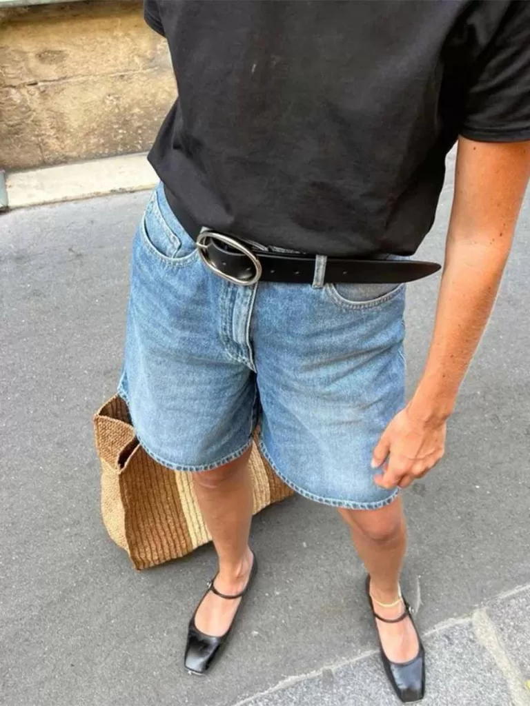 Black tshirt and denim bermuda shorts with black ballet flats