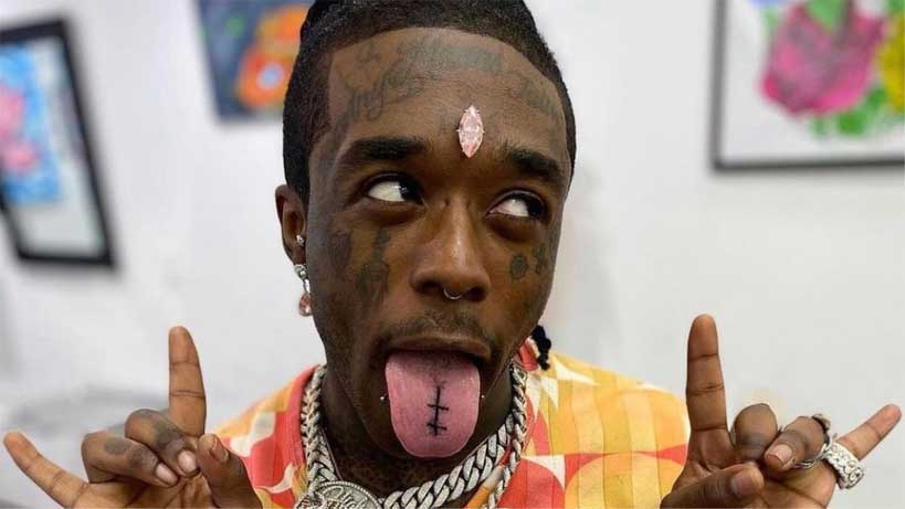 Lil Uzi Vert with a $24 million dollar pink diamond implanted into his forehead